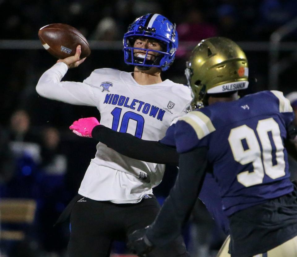 Middletown's Austin Troyer throws in the third quarter of Salesianum's 24-14 win in a DIAA Class 3A state tournament semifinal at Abessinio Stadium, Friday, Nov. 24, 2023.