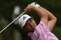 Xander Schauffele tees off on the fourth hole during the third round of the Masters golf tournament on Saturday, April 10, 2021, in Augusta, Ga. (AP Photo/Gregory Bull)