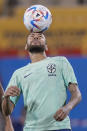 Brazil's Neymar practices during a training session at the Grand Hamad stadium in Doha, Qatar, Sunday, Dec. 4, 2022. Brazil will face South Korea in a World Cup round of 16 soccer match on Dec. 5. (AP Photo/Andre Penner)