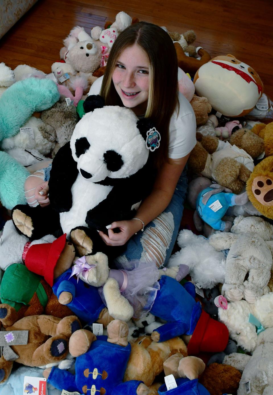 Taylor Putterman, 12, of the Hagerstown area, has collected over 175 teddy bears that she will give to children's hospitals this holiday season. Her goal is to collect over 600 teddy bears to donate to six hospitals this year.