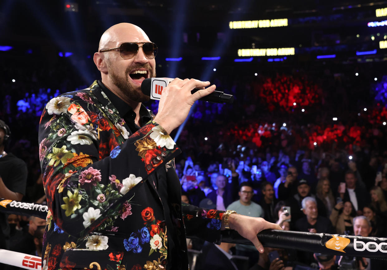 NEW YORK, NEW YORK - DECEMBER 11: Tyson Fury surprises Bob Arum singing him happy birthday at Madison Square Garden on December 11, 2021 in New York City. (Photo by Mikey Williams/Top Rank Inc via Getty Images)