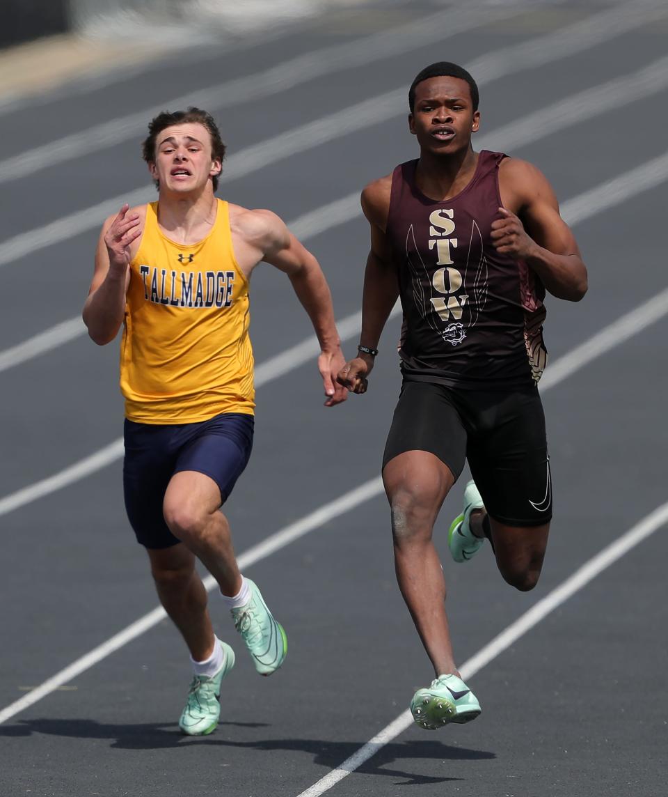 Stow's Brian Turner, right, finishes in fourth place ahead of Tallmadge's Gino Spano in the 100 meter dash at the Nordonia Knight Relays Saturday.