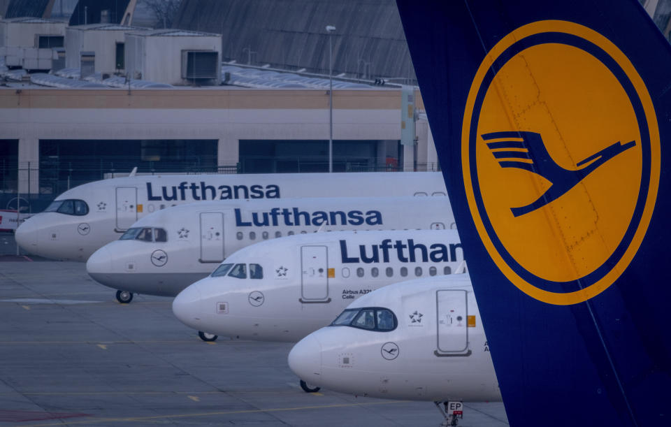 Lufthansa aircrafts are parked at the airport in Frankfurt, Germany, Thursday, March 7, 2024. German Lufthansa airline and the airport security staff are on a strike causing the cancellation go most of the flights. (AP Photo/Michael Probst)