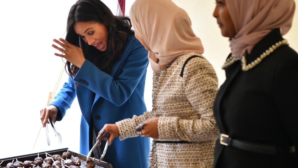 <p> During a visit to celebrate the launch of a cookbook in support of victims of the Grenfell Fire, Meghan showcased some of her culinary skills... or tried to. </p> <p> In the candid photo, something hasn't gone to plan as she flashes a panicked smile by the grill. </p> <p> Fortunately, we know that the Duchess is (usually) quite the cook at home, with roast chicken commonly cited as a speciality, the dish she and Harry whipped up at home the night he proposed. </p>