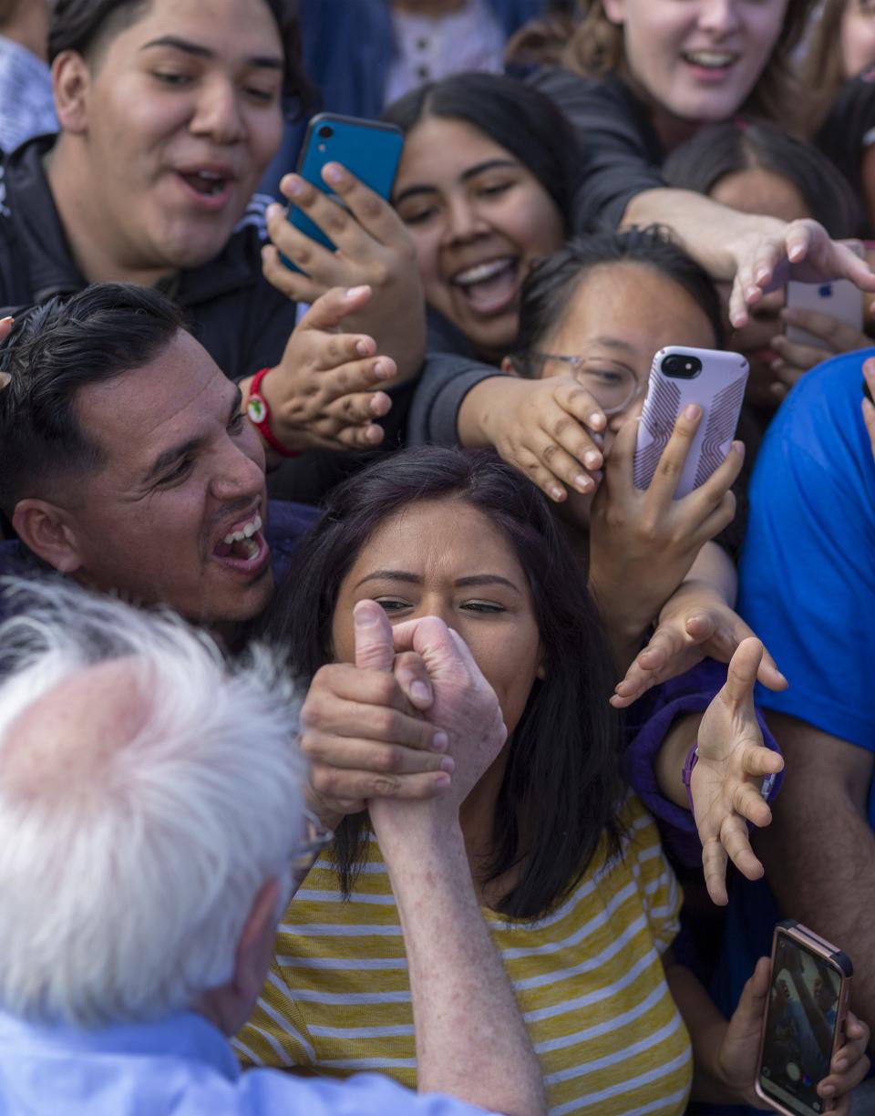 Democratic presidential candidate Sen. Bernie Sanders greets supports at his Get Out the Early Vote rally at Valley High School on February 21, 2020 in Santa Ana, California.