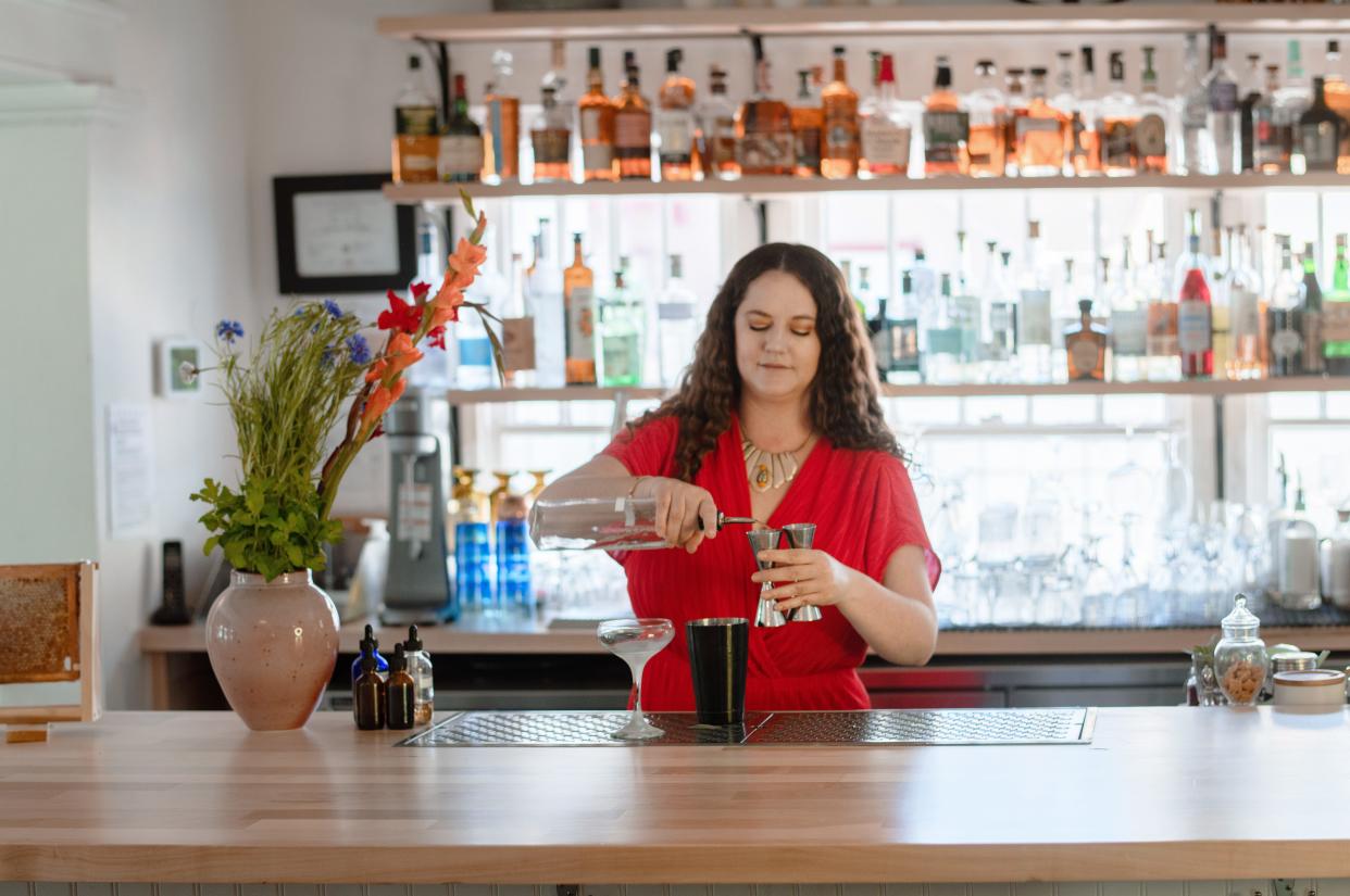 Aspen Bingham mixes her cocktail at the Garden Bar PHX.