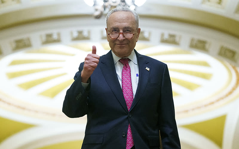 Majority Leader Chuck Schumer (D-N.Y.) gives a thumbs