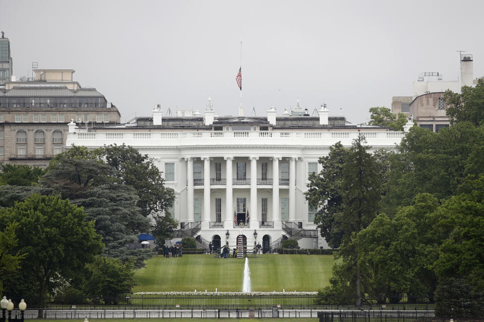 FILE - In this May 22, 2020, file photo, an American flag flies at half-staff above the White House in Washington.As a candidate for the White House, President Donald Trump once said he wanted “whatever is best” for the residents of the nation’s capital. But over the course of his more than three years in office a disconnect between the president and District of Columbia has emerged - a chasm that has only grown during the coronavirus pandemic. (AP Photo/Patrick Semansky)