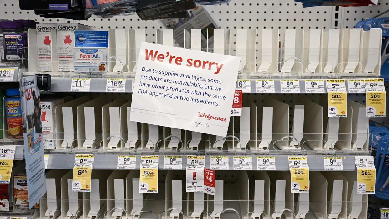 An empty shelf at Walgreens, with a sign saying: We're sorry. Due to supplier shortages, some products are unavailable, but we have other products with the same FDA-approved active ingredients. Walgreens