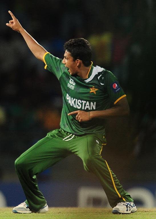 Pakistan's Raza Hasan celebrates dismissal of Australian cricketer Glenn Maxwell during an ICC Twenty20 Cricket World Cup's Super Eight match in 2012