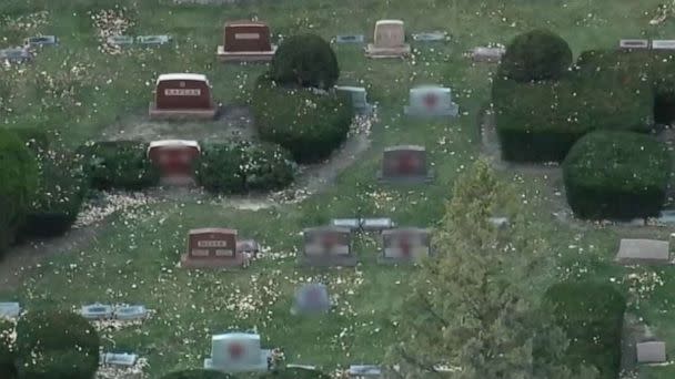 PHOTO: A Jewish cemetery has been defaced after dozens of headstones were found spray painted with swastikas and graffiti in bright red paint in Waukegan, Illinois on Monday, Nov. 14, 2022. (ABC News / WLS)
