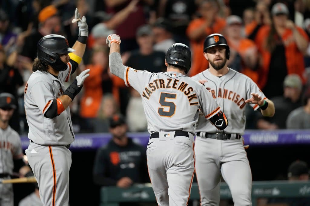 GIGANTES-ROCKIES (AP)