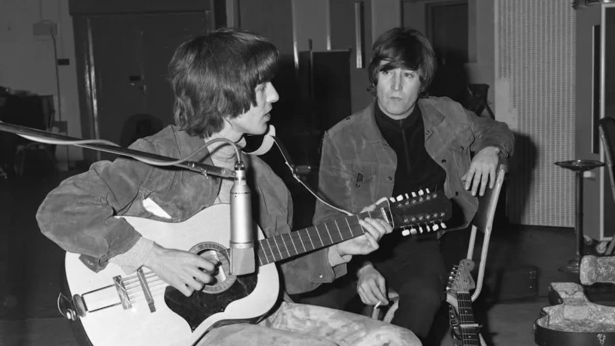  George Harrison playing John Lennon's Framus Hootenanny 12-string. 