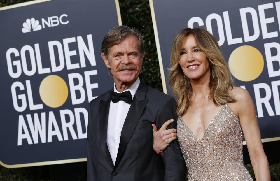 76th Golden Globe Awards - Arrivals - Beverly Hills, California, U.S., January 6, 2019 - William H. Macy and Felicity Huffman. REUTERS/Mike Blake