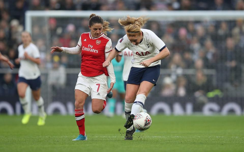 Rachel Furness of Tottenham battles with Danielle van de Donk of Arsenal  - GETTY IMAGES