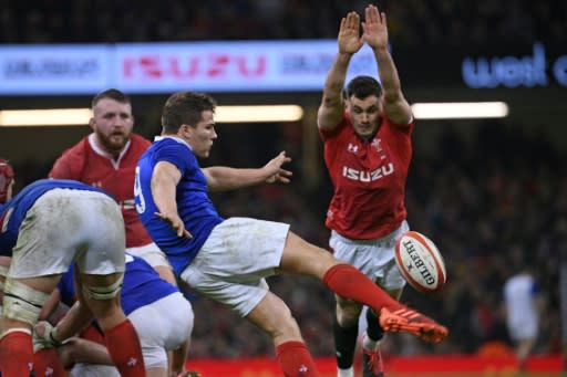 In the clear: France scrum-half Antoine Dupont clears the ball in Cardiff