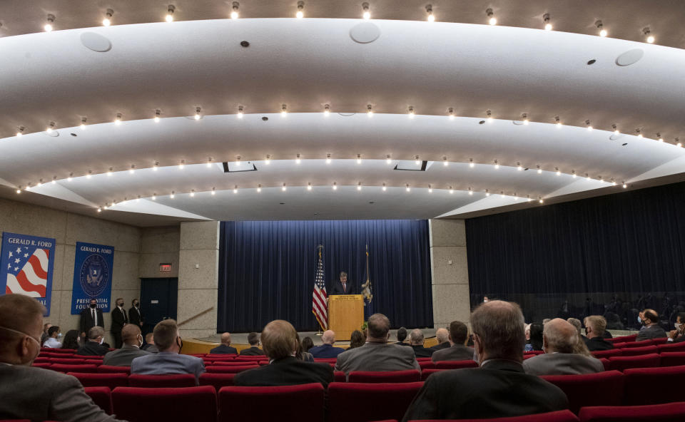 DELETES REFERENCE TO LAW ENFORCEMENT OFFICIALS - Attendee sit apart while listening to U.S. Attorney General William Barr speak at the Gerald R. Ford Presidential Museum in Grand Rapids, Mich., Thursday, July 16, 2020. (Nicole Hester/Mlive.com/Ann Arbor News via AP)