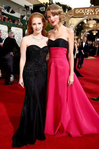<p>Christopher Polk/NBC/NBCUniversal via Getty</p> Chastain and Swift at the Golden Globes in 2014