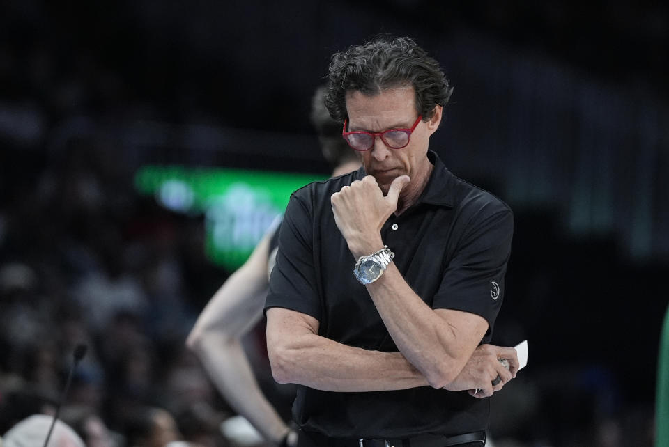 Atlanta Hawks head coach Quin Snyder walks on the sideline during the first half of an NBA basketball game against the Boston Celtics Monday, March 25, 2024, in Atlanta. (AP Photo/John Bazemore)