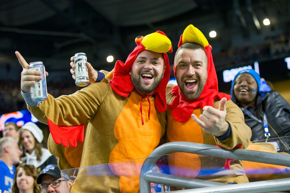 DETROIT, MI - NOVEMBER 22: Some Detroit Lions fans dressed up in their turkey outfits having fun during an NFL, Thanksgiving Day game against the Chicago Bears at Ford Field on November 22, 2018 in Detroit, Michigan. The Bears defeated the Lions 23-16. (Photo by Dave Reginek/Getty Images)