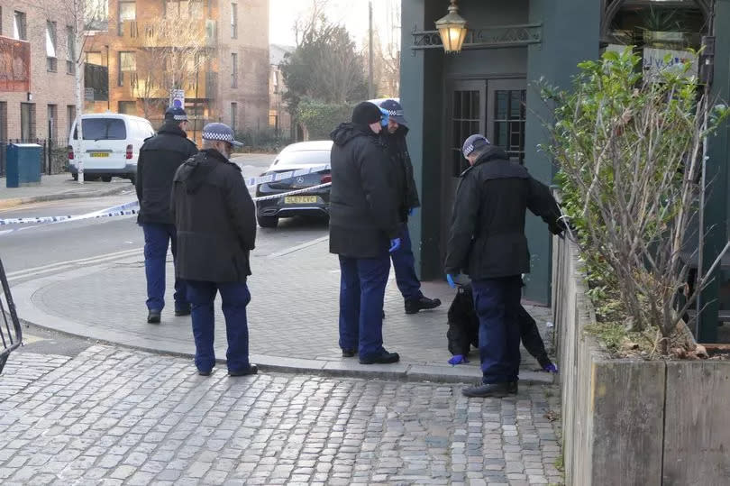 Police investigating outside The Duke following the machete attack