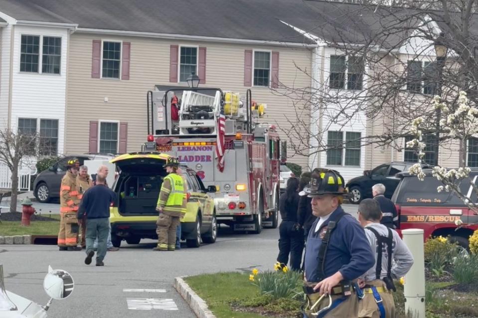 Firefighters and residents gather in the streets in Lebanon, New Jersey, after the earthquake. Robert Miller for NY Post