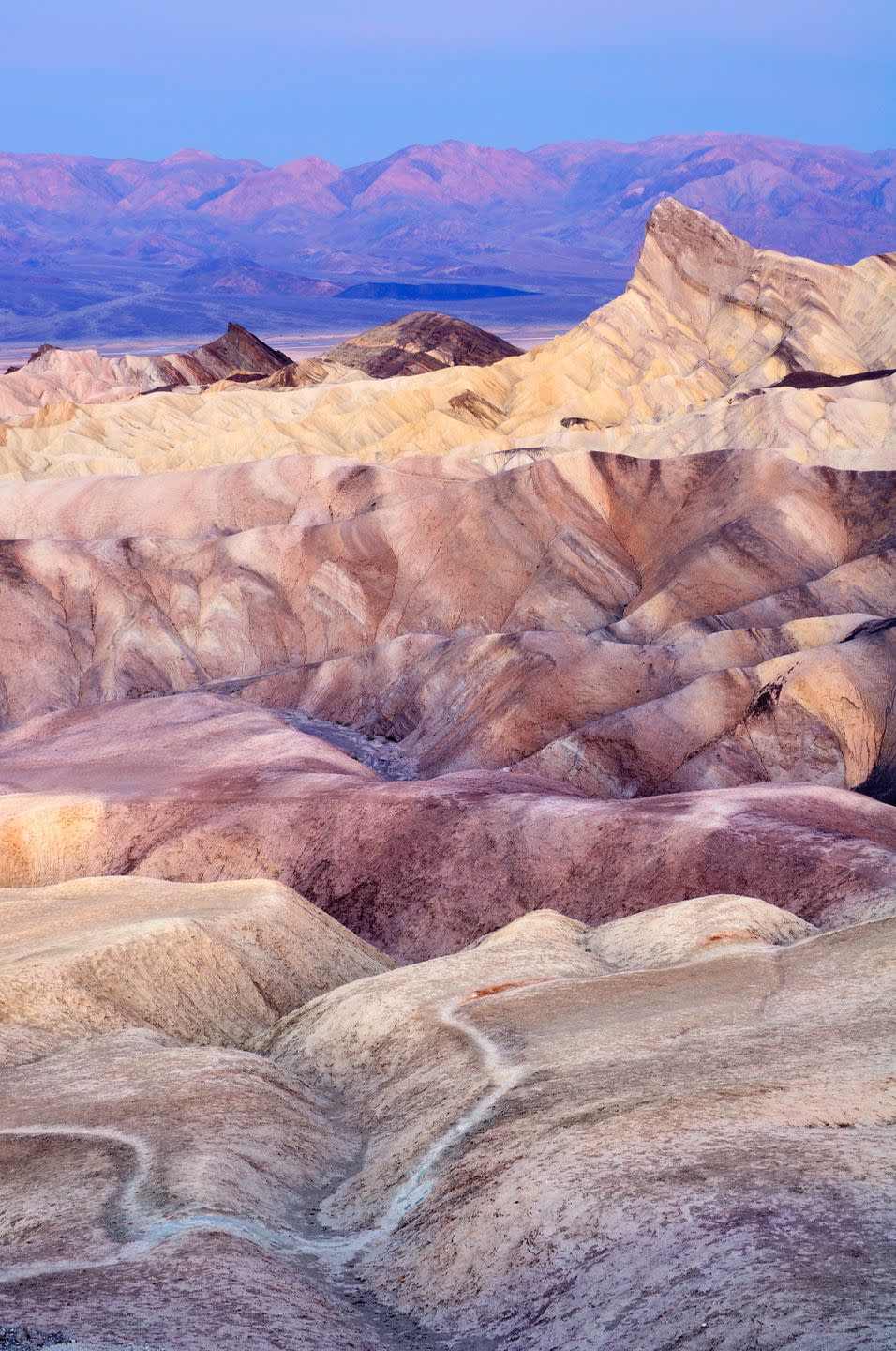 <p><strong>Where: </strong>Death Valley National Park, California</p><p><strong>Why We Love It: </strong>Located on the eastern border of California, Death Valley is America's lowest, hottest, and driest point. But that doesn't make watching the sunset from Zabriskie Point any less beautiful.</p>