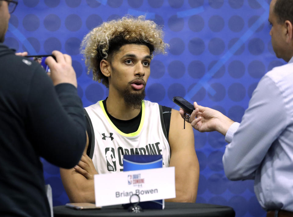 Brian Bowen speaks with the media during the second day of the NBA draft basketball combine in Chicago, Friday, May 17, 2019. (AP Photo/Nam Y. Huh)