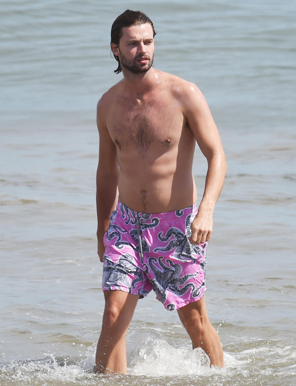 <p>Patrick Schwarzenegger goes for a swim on Sunday in Laguna Beach, California.</p>