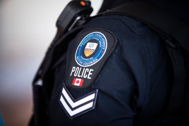 An officer from the Combined Forces Special Enforcement Unit of B.C (CFSEU) is pictured during a press conference in B.C. The unit has applauded the prosecution of so called 'straw' gun purchasers.