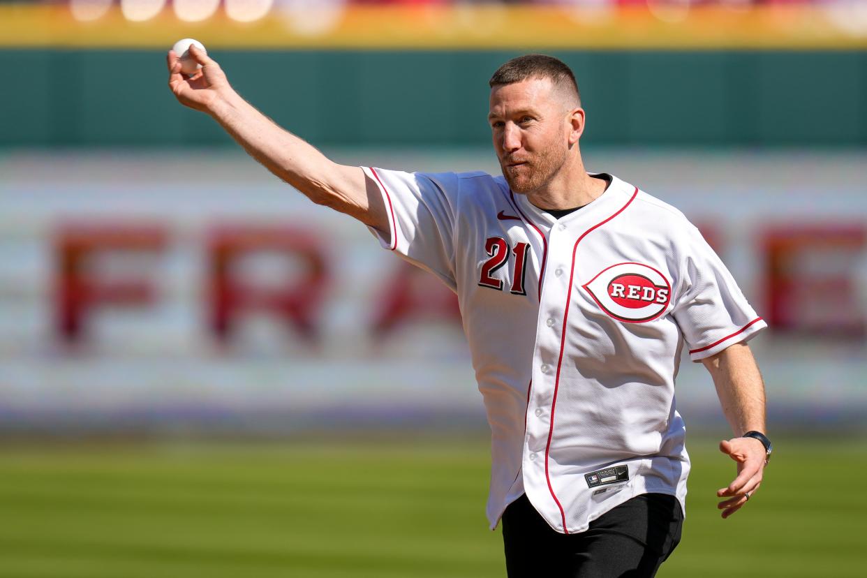 Former Reds third baseman Todd Frazier throws a ceremonial first pitch