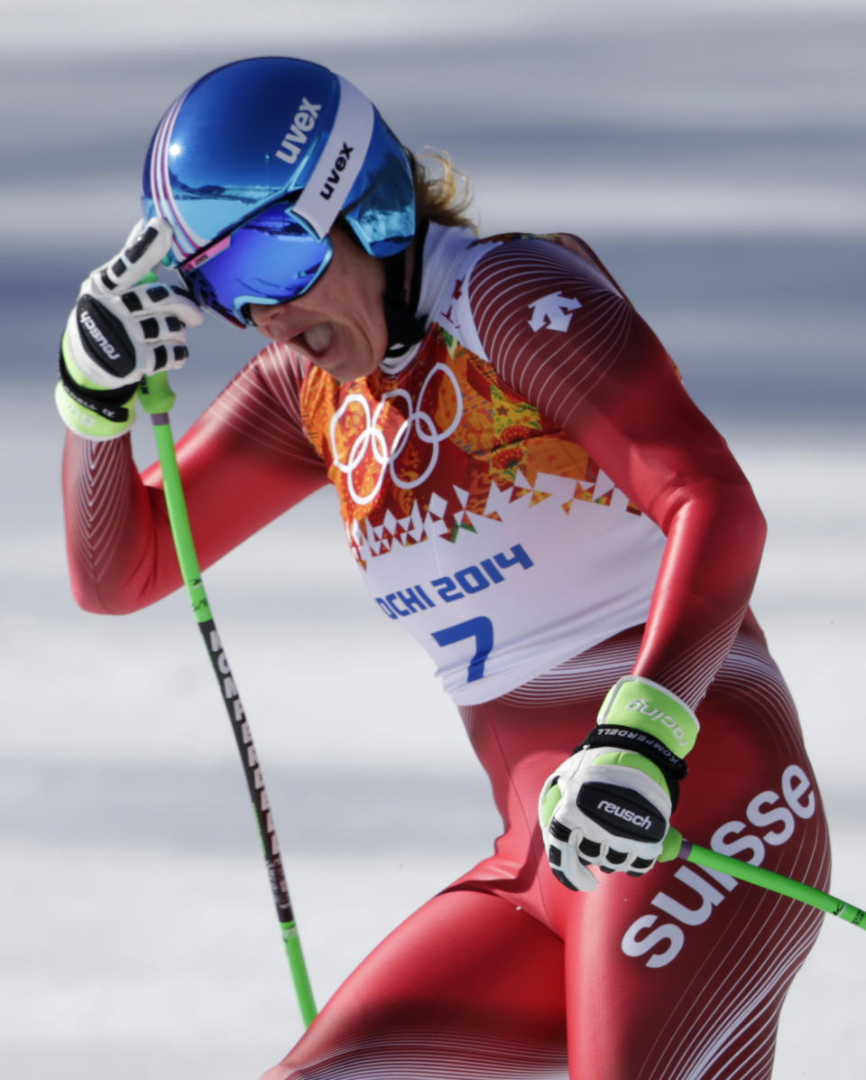 Switzerland's Nadja Jnglin-Kamer arrives in the finish area during a women's downhill training run at the Sochi 2014 Winter Olympics, Thursday, Feb. 6, 2014, in Krasnaya Polyana, Russia. (AP Photo/Gero Breloer)
