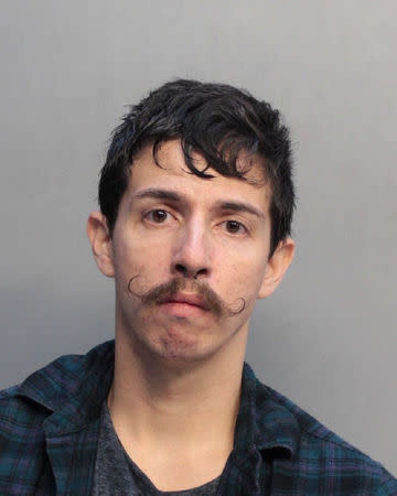 Jacob A Garcia appears after his arrest at Miami International Airport in a booking photograph released April 23, 2018. Miami-Dade Corrections/Handout via REUTERS