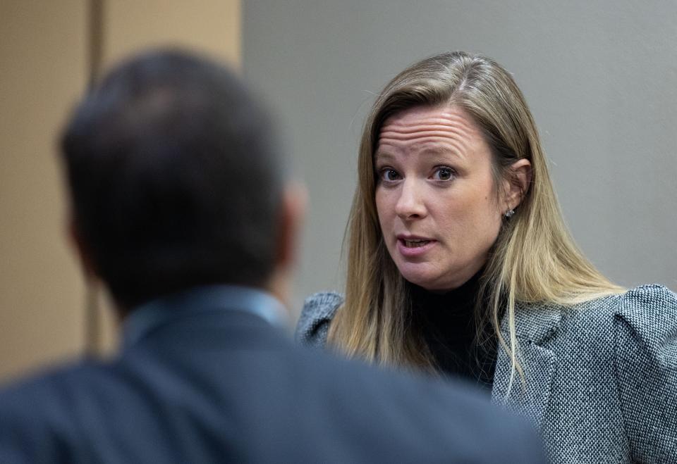Assistant State Attorney Georgia Cappleman speaks with defendant Charlie Adelson’s attorney Daniel Rashbaum after a bond hearing concluded for Adelson on Friday, Sept. 9, 2022. Adelson is accused of orchestrating and financing the murder of Florida State University law professor Dan Markel. 