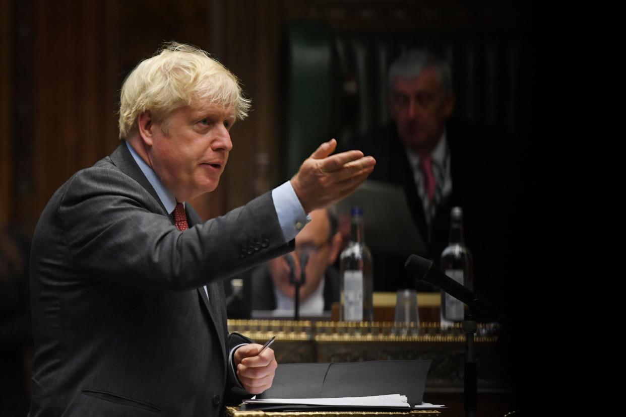 Boris Johnson answers questions following his coronavirus statement in the House of Commons (UK PARLIAMENT/AFP via Getty Imag)
