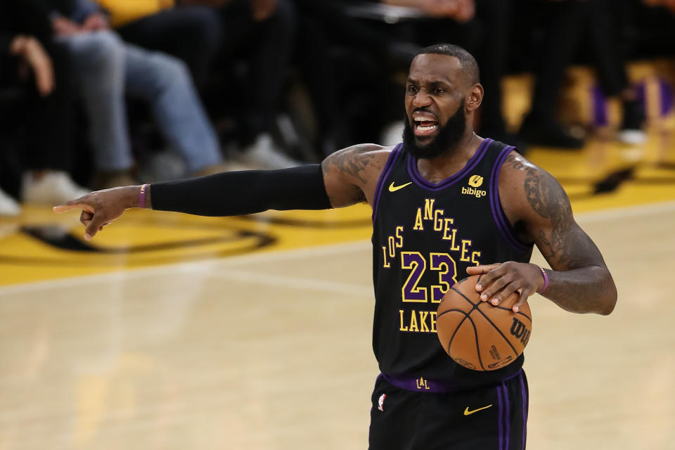 LOS ANGELES, CA - DECEMBER 18: Los Angeles Lakers forward LeBron James (23) calls for movement to the right side of the court during the NBA game between the New York Knicks and the Los Angeles Lakers on December 18, 2023, at Crypto.com Arena in Los Angeles, CA. (Photo by Jevone Moore/Icon Sportswire via Getty Images)