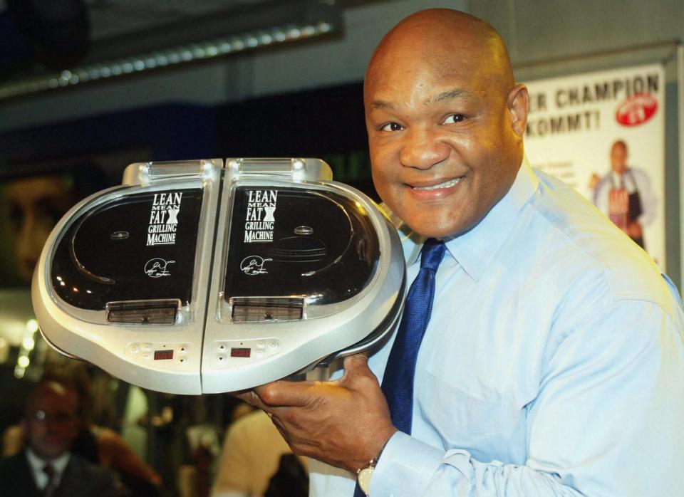 George Foreman presents the George Foreman Girl in Hamburg, Germany, on October 5, 2004. (Photo: Cathrin Mueller/Bongarts/Getty Images)