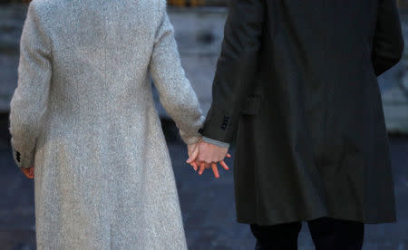 Prince Harry and Meghan Markle hold hands as they leave after visiting radio station Reprezent FM, in Brixton, London January 9, 2018. REUTERS/Peter Nicholls