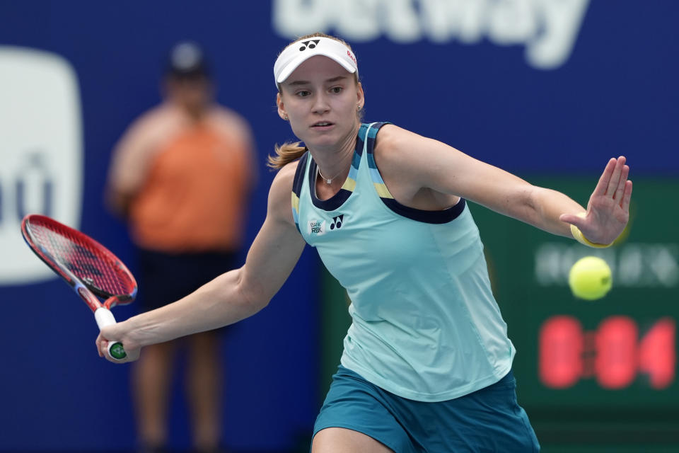 Elena Rybakina, of Kazakhstan, prepares to hit a return to Danielle Collins during the women's singles final of the Miami Open tennis tournament, Saturday, March 30, 2024, in Miami Gardens, Fla. (AP Photo/Lynne Sladky)