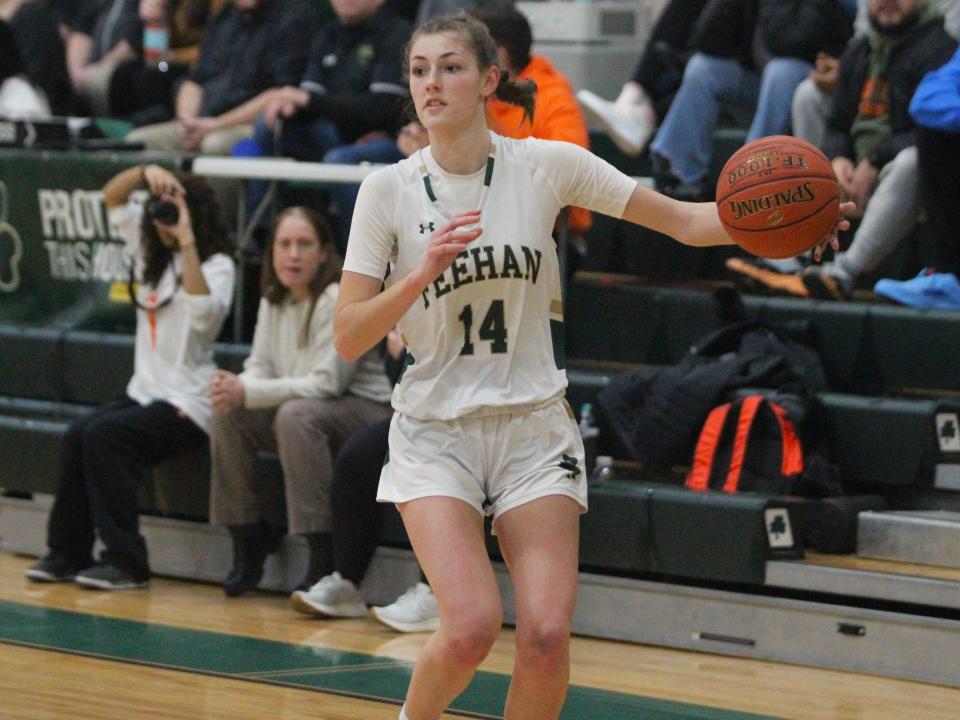 Bishop Feehan's Mollie Mullen, a Dighton resident, looks for an open teammate during a Division 1 Round of 16 game against Taunton.