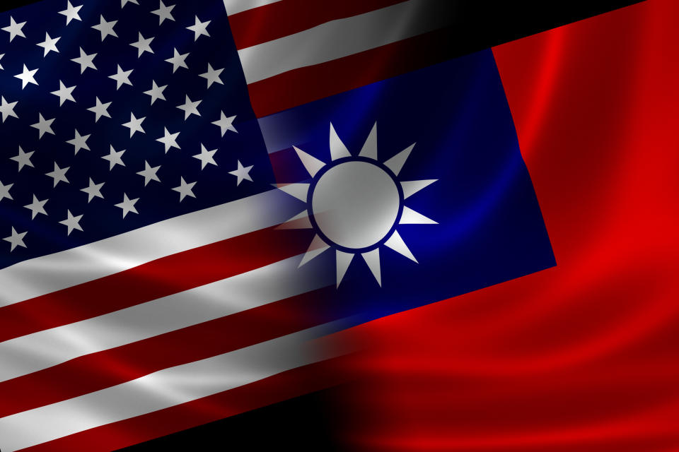 Merged US and Taiwanese flag on satin texture. Concept of the long historical and political relations between the two countries.