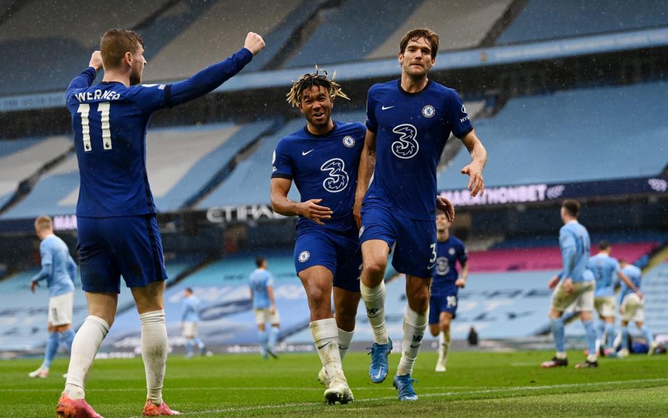 Marcos Alonso of Chelsea celebrates with team mates Reece James and Timo Werner after scoring their side's second goal  - Getty Images