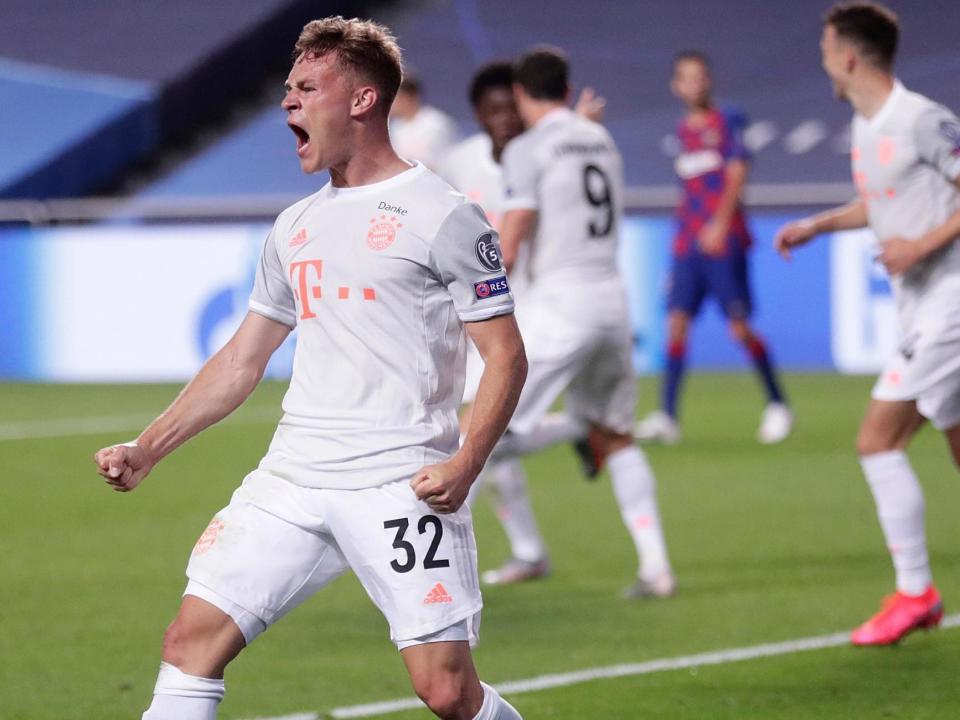 Joshua Kimmich celebrates scoring for Bayern Munich: POOL/AFP via Getty Images