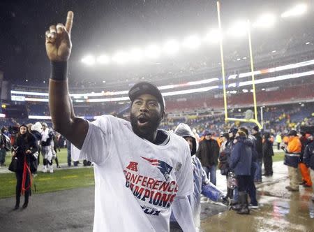 Jan 18, 2015; Foxborough, MA, USA; New England Patriots cornerback Darrelle Revis waves to the crowd after the AFC Championship Game against the Indianapolis Colts at Gillette Stadium. Mandatory Credit: David Butler II-USA TODAY Sports
