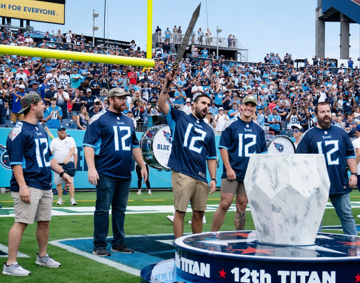 MNPD members, from left, Det. Michael Collazo, Det. Ryan Cagle, Det. Zachary Plese, Officer Rex Engelbert and Sgt. Jeff Mathes are recognized as the Tennessee Titans 12th Titan before their NFL game against the Los Angeles Chargers at Nissan Stadium Sunday afternoon, Sept. 17, 2023. The men were the first responders to The Covenant School shooting that left three children and three adults dead in March of this year.