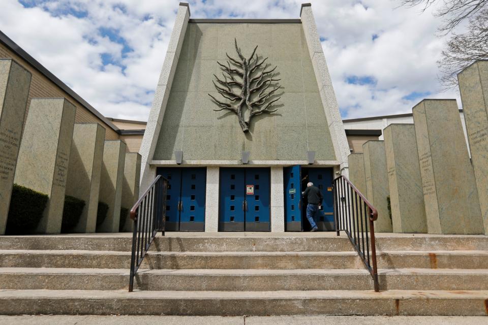 Congregation President Martin Levin enters the Tifereth Israel Synagogue on Brownell Avenue in New Bedford, which is celebrating its 100th anniversary.