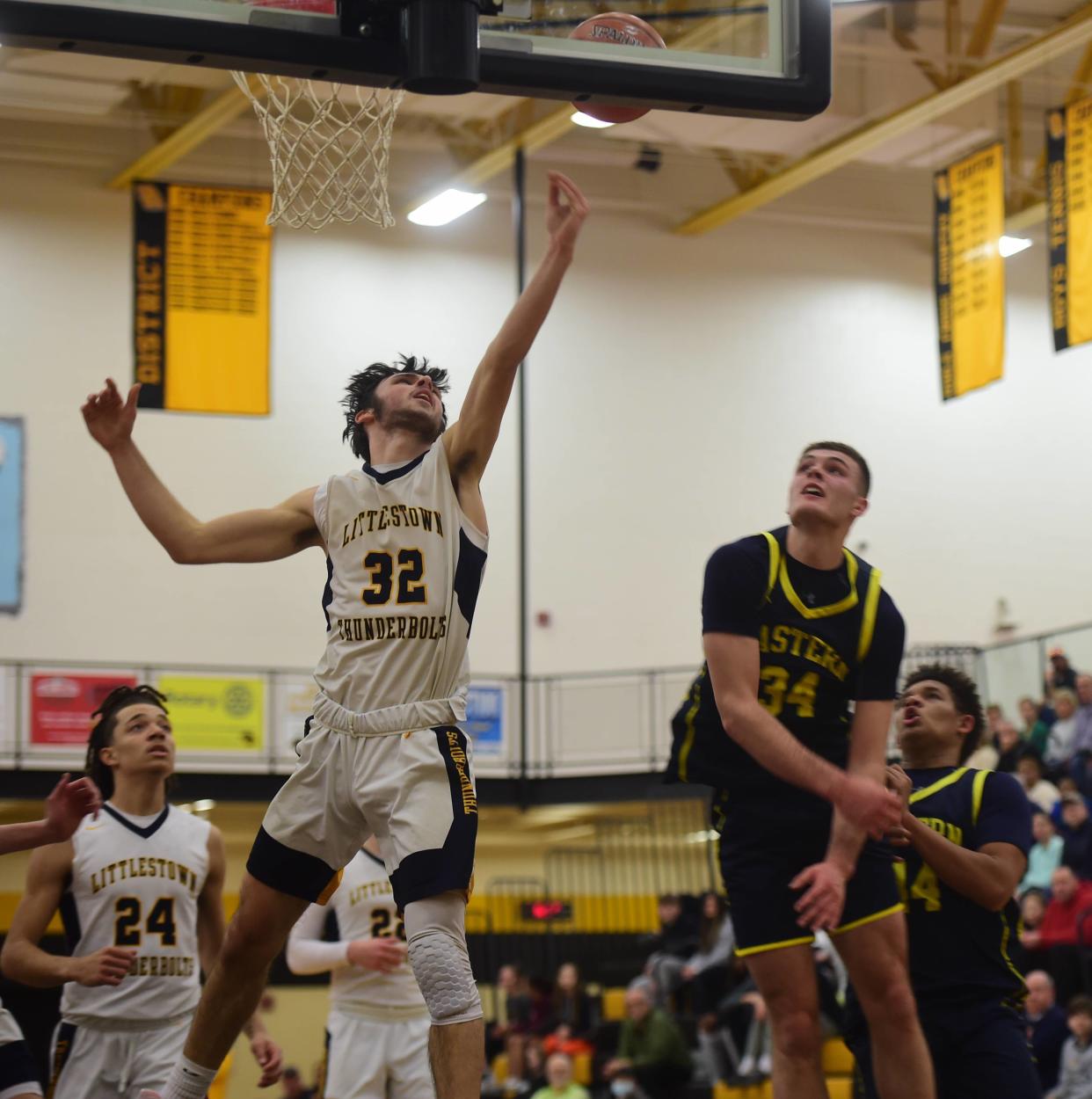 Littlestown's Zyan Herr goes up for a layup over Eastern York's Carter Wamsley Friday. Eastern York beat Littlestown, 57-49, in the YAIAA boys' basketball quarterfinals at Red Lion High School, Friday, Feb. 11, 2023.