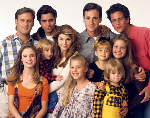 <p>Bob D'Amico/Disney General Entertainment Content via Getty</p> FULL HOUSE - Season Seven - Gallery - 9/14/93, Pictured, from left: Dave Coulier (Joey), Andrea Barber (Kimmy), John Stamos (Jesse), Blake Tuomy-Wilhoit (Nicky), Lori Loughlin (Rebecca), Jodie Sweetin (Stephanie), Bob Saget (Danny), Ashley Olsen (Michelle), Dylan Tuomy-Wilhoit (Alex), Candace Cameron (D.J.), Scott Weinger (Steve)