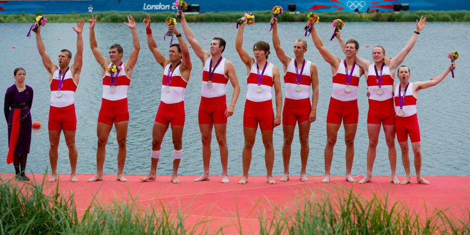 Canada's men's eight rowing team members Gabriel Bergen, left to right Douglas Csima, Rob Gibson, Conlin McCabe, Malcolm Howard, Andrew Byrnes, Jeremiah Brown, Will Crothers, and cox Brian Price celebrate their silver medal at Eton Dorney during the 2012 Summer Olympics in Dorney, England on Wednesday, August 1, 2012. THE CANADIAN PRESS/Sean Kilpatrick