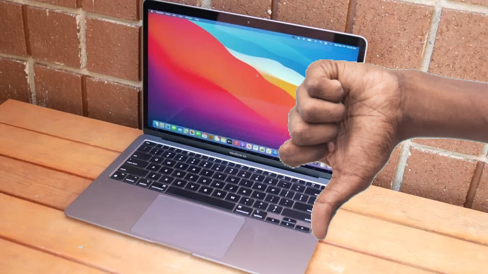  M1 MacBook with thumbs down 